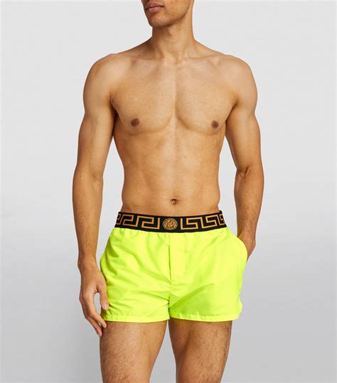 versace greca-print swim shorts|Versace swim shorts yellow.